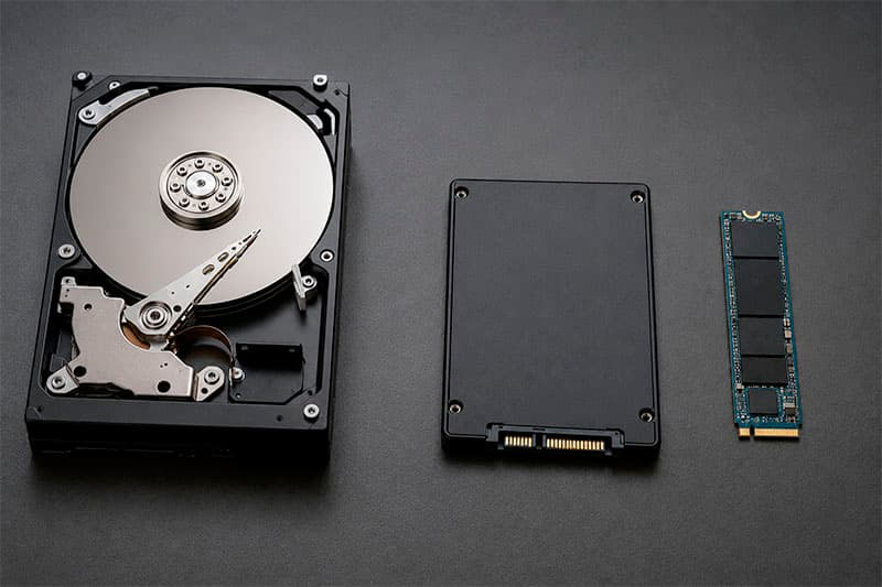 IDE hard drive, SATA SSD, and M.2 NVMe storage devices